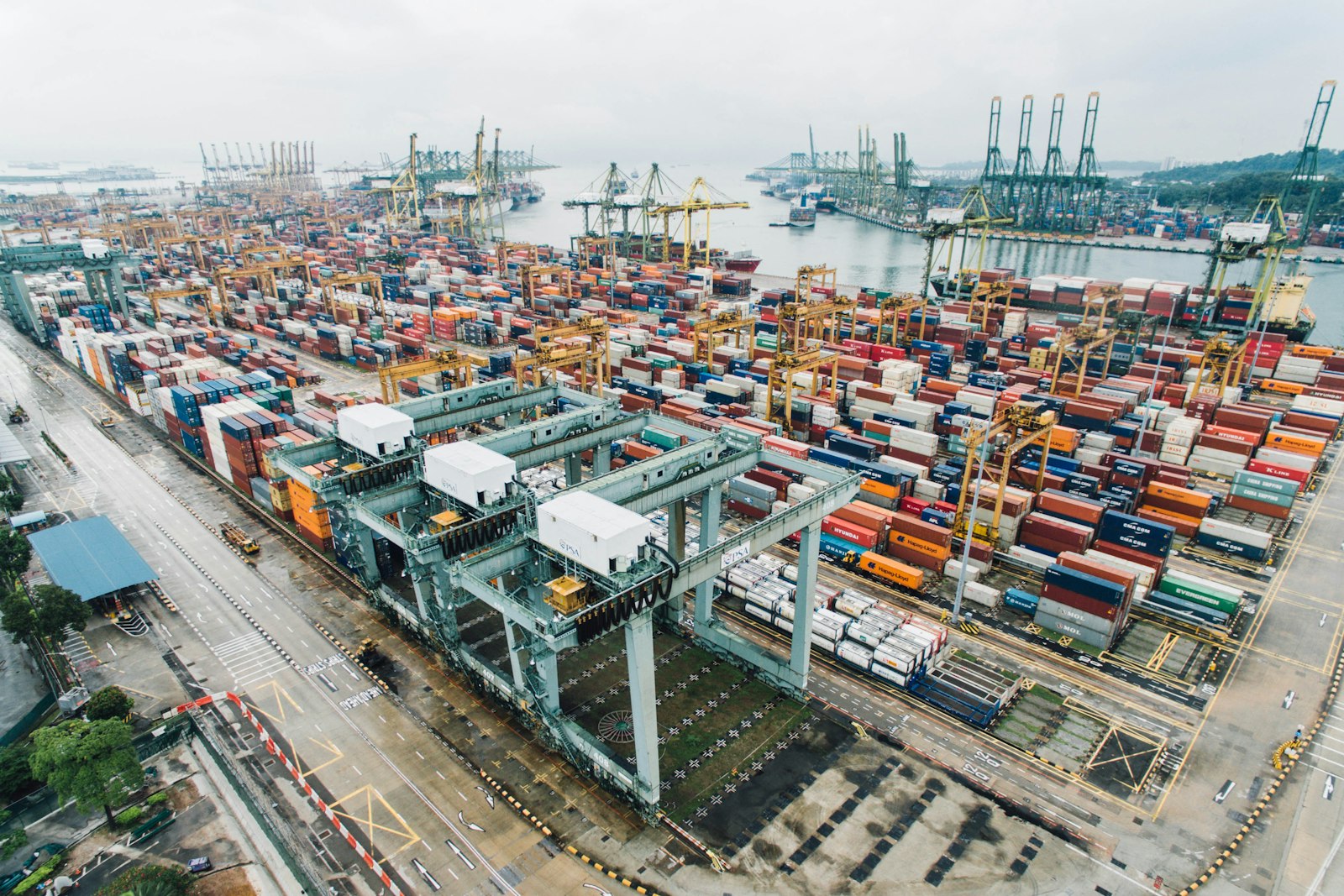Container port with stacked shipping containers
